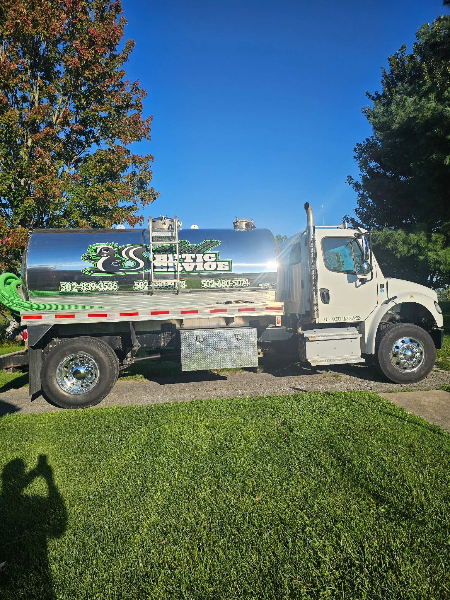 Septic pumping equipment on site Professional septic tank pumping equipment deployed at a Kentucky property