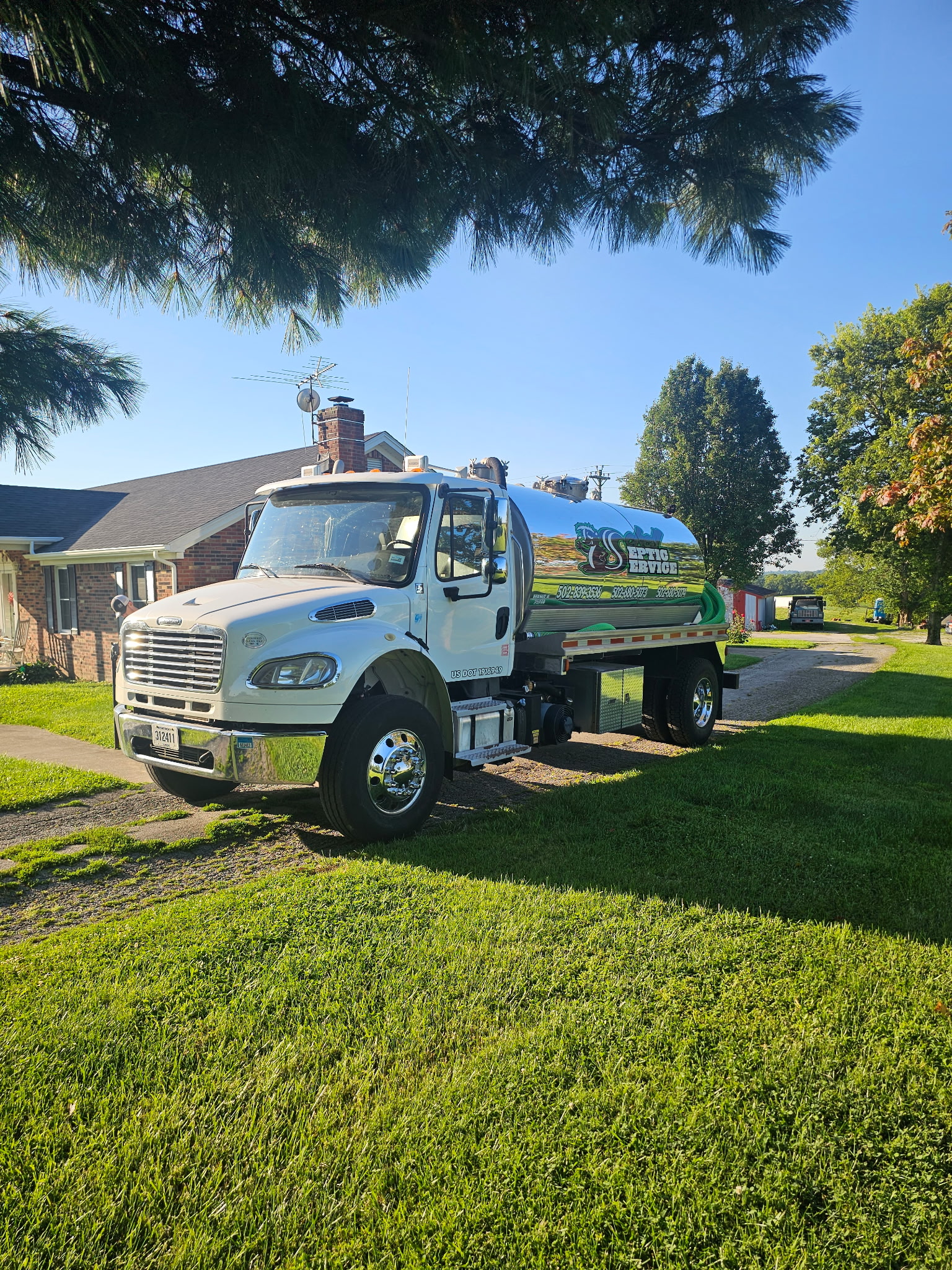 Field service with vacuum equipment Schell Septic Service field work with professional vacuum equipment